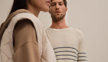 A man and a woman wearing Tom Tailor outfits
