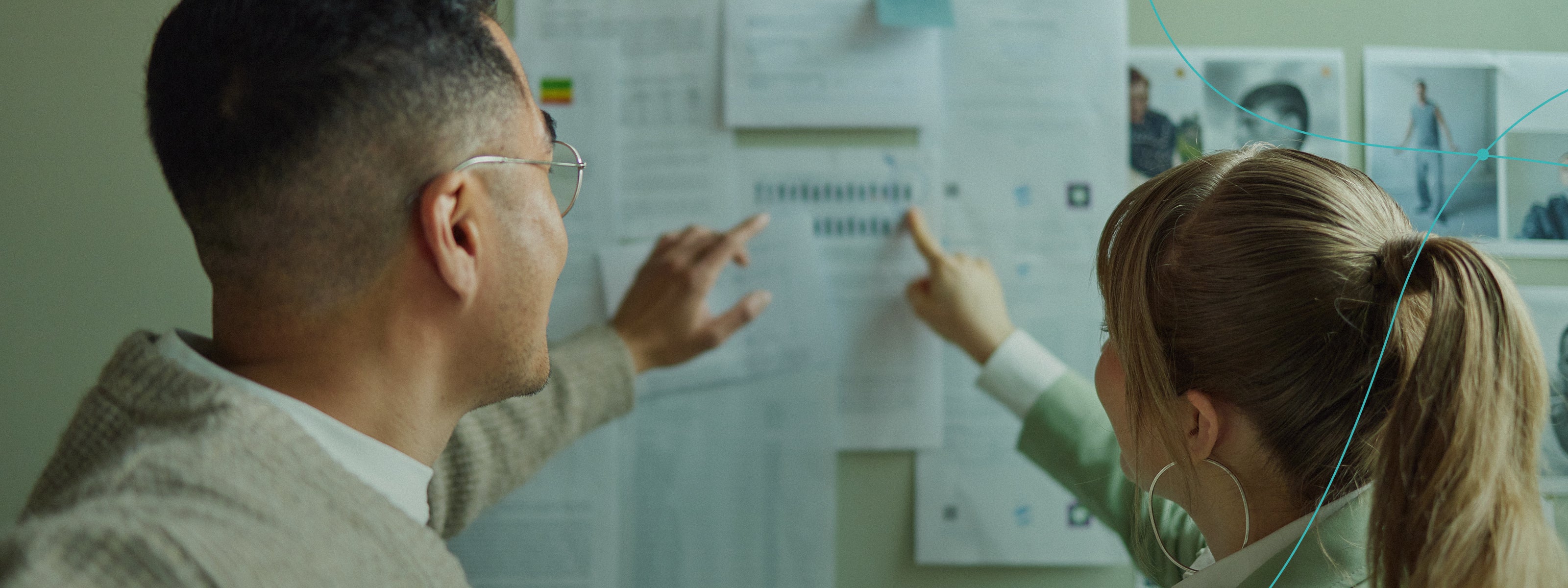 Managers discussing the supply chain multi-level visivilty and it's labour standards on the wall