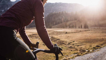 Woman riding a mountain bike in the alps
