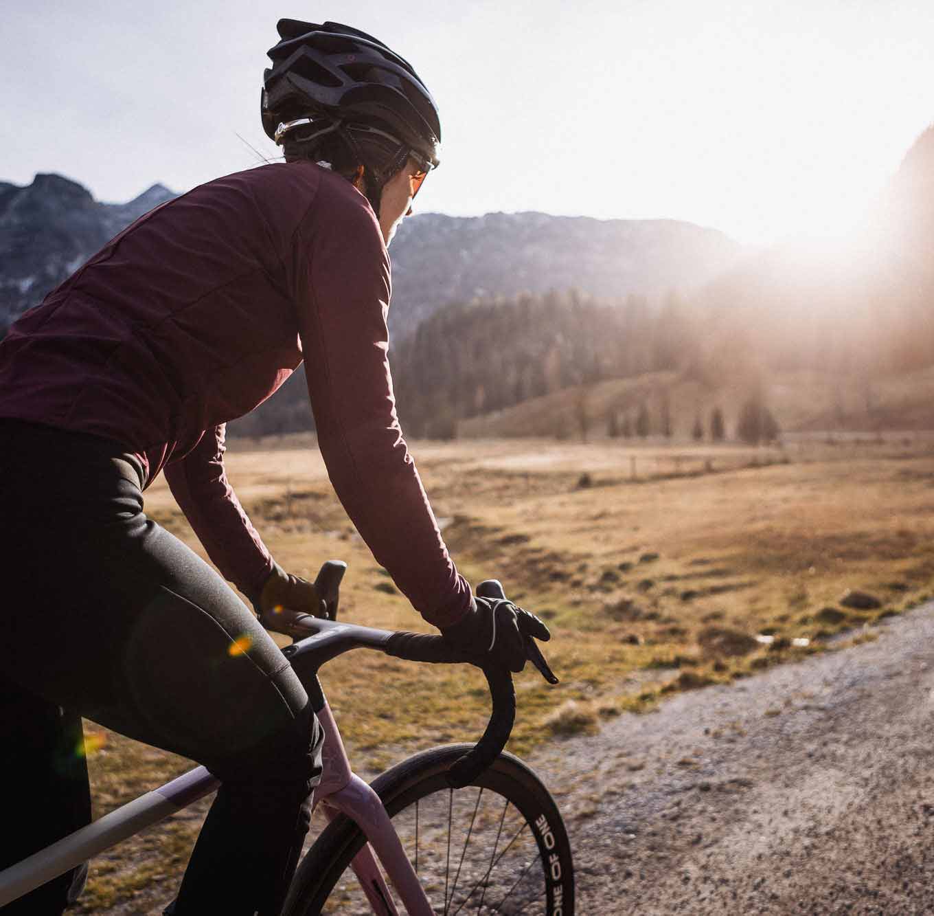 Woman riding a mountain bike in the alps